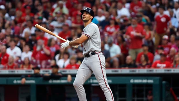 Jun 23, 2023; Cincinnati, Ohio, USA; Atlanta Braves first baseman Matt Olson (28) watches hitting a two-run home run against the Cincinnati Reds during the fifth inning at Great American Ball Park.